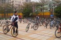 China students riding a bike after school