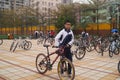 China students riding a bike after school