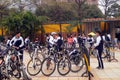 China students riding a bike after school