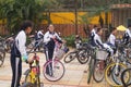 China students riding a bike after school