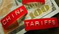 China Tariffs labels on a US hundred dollar bill Royalty Free Stock Photo