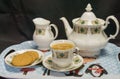 China tea set with cup of tea and biscuits Royalty Free Stock Photo