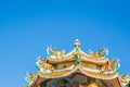 China temple roof with Chinese style dragon statue and blue sky Royalty Free Stock Photo