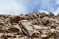 China, Tibet. Summer mountain landscape. Scattering of stones