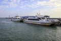 Wuzhizhou Island. Sea port a boat with tourists to be sent to the island editorial
