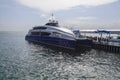 China, Wuzhizhou Island - December 2, 2018: Wuzhizhou Island. Sea port, a boat with tourists to be sent to the island, editorial