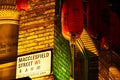 Street signage on red brick wall at night Red lantern in Chinatown London chinese new year