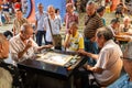 Chinatown, Singapore - 11 2018: Old man playing Xiangqi, chinese chess Royalty Free Stock Photo