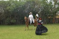 chincha , Peru Lady in dress dancing a traditional folk dance la marinera with a Peruvian Paso-caballo de paso -