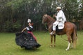 chincha , Per Lady in dress dancing a traditional folk dance la marinera with a Peruvian Paso-caballo de p