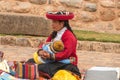 Market with handmade alpaca textile products in Chinchero, Peru