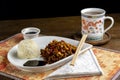 Chineese dish with tea and soy sauce arrangement