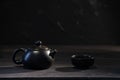 Chineese tea set on wooden table black background