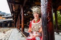 Chines Miao woman wearing traditional clothes in Xijiang Qianhu Miao Village One Thousand Household Miao Village , in Guizhou