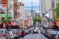 Chines people and Oakland bay bridge as seen from Chinatown in S