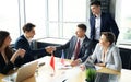 Chinese and American leaders shaking hands on a deal agreement. Royalty Free Stock Photo