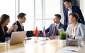 Chinese and American leaders shaking hands on a deal agreement. Royalty Free Stock Photo