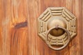 Chinese ancient bronze lock in wooden door.