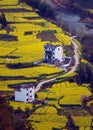 Chinese ancient old valley house landscape in mountain with Rape flower, in anhui, China. Royalty Free Stock Photo