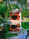 A Chinese ancient pavilion by the lake gardens at Montreal Botanical Garden Royalty Free Stock Photo