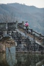 Chinese ancient water town with tradition people, house, culture and reflection Royalty Free Stock Photo