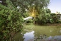 Chinese arch bridge with pond and trees on the park Royalty Free Stock Photo