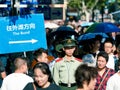 Chinese armed police command traffic in line on Nanjing Road