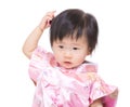 Chinese baby girl feeling confuse Royalty Free Stock Photo