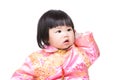 Chinese baby girl scratch head Royalty Free Stock Photo