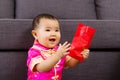 Chinese baby so happy for red pocket Royalty Free Stock Photo