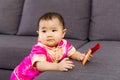 Chinese baby holding red pocket Royalty Free Stock Photo