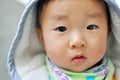 A Chinese baby looking at camera