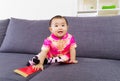 Chinese baby touching red pocket Royalty Free Stock Photo