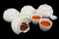Chinese Barbecued Pork Bun with Teapot and Teacups Royalty Free Stock Photo