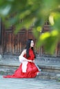 Chinese beauty has a rest on a step Royalty Free Stock Photo