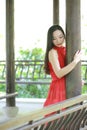 Chinese beauty relaxing in a park and enjoy her vactaion Royalty Free Stock Photo