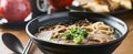 Chinese beef soup in bowl panorama