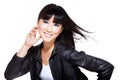 Chinese biker chick in black with windswept hair Royalty Free Stock Photo