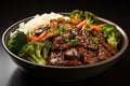 Chinese black pepper beef and broccoli stir-fry served in a light bowl. Royalty Free Stock Photo