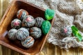 Chinese blooming tea and sprig of mint in a wooden bowl. Royalty Free Stock Photo