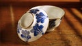 Chinese blue and white ceramic bowl on wooden table Royalty Free Stock Photo