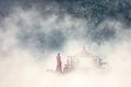 Chinese boats on foggy lake Royalty Free Stock Photo