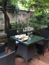 Chinese breakfast on a table in a hotel courtyard in Xiamen city, China