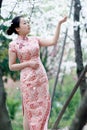 Chinese bride in traditional dress outdoor