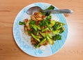 Chinese Broccoli fried with crispy pork Royalty Free Stock Photo