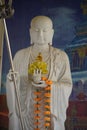 Chinese Buddha with titled trident image