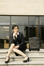 Chinese business women with suitcase Royalty Free Stock Photo