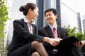 Chinese Businessman And Businesswoman Talking Royalty Free Stock Photo