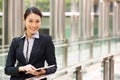 Chinese Businesswoman Working On Tablet Computer