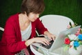 Chinese Businesswoman Working On Tablet Computer Outside Office. Royalty Free Stock Photo